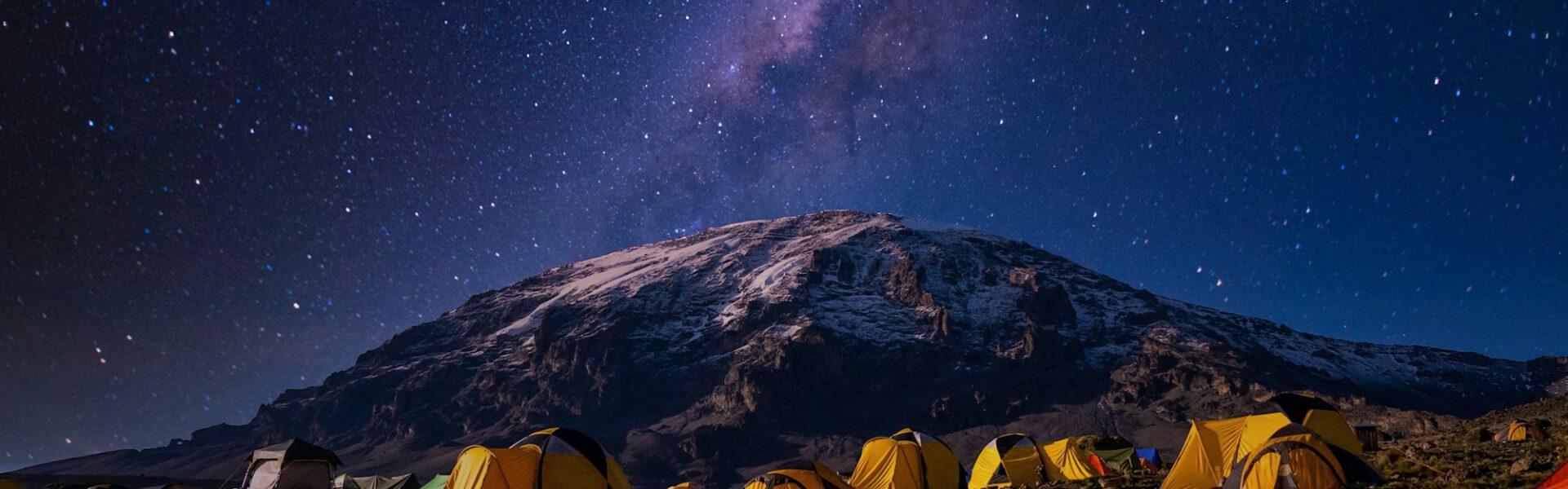 Beautiful scenery of yellow tents in the Kilimanjaro National Park